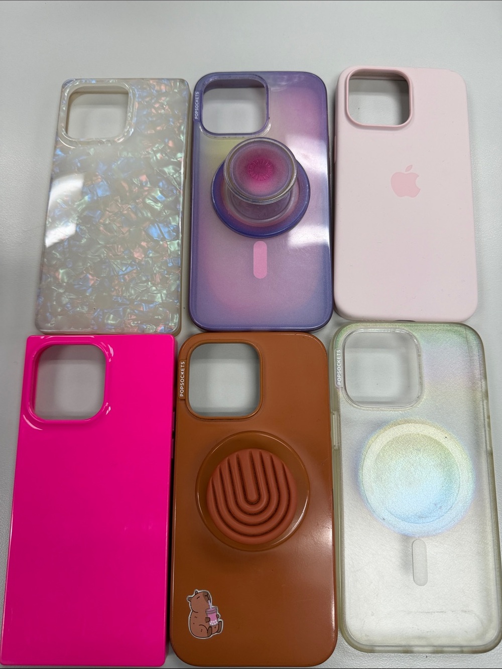 Apple & Pop Socket Assorted Color iPhone Cases - Pink, Hot Pink, Purple, Brown